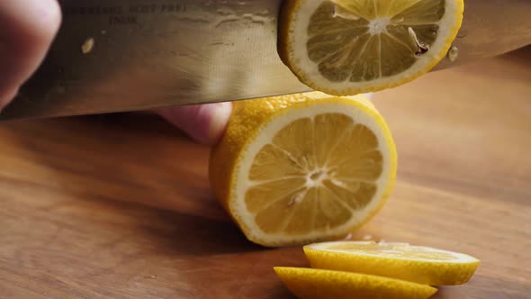 Slicing citrus fruit lemon
