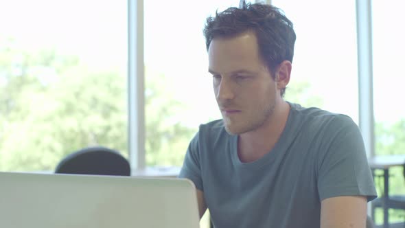 Man using laptop computer