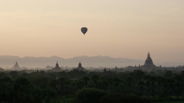 Balloon flying during sunrise over the Pagodas in Bagan
