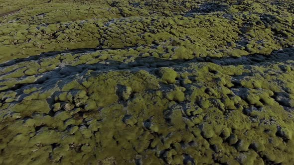 Flying Over Rocks And Moss In Iceland