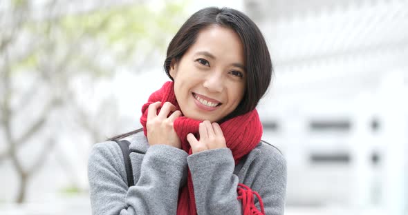 Woman smile to camera at outdoor