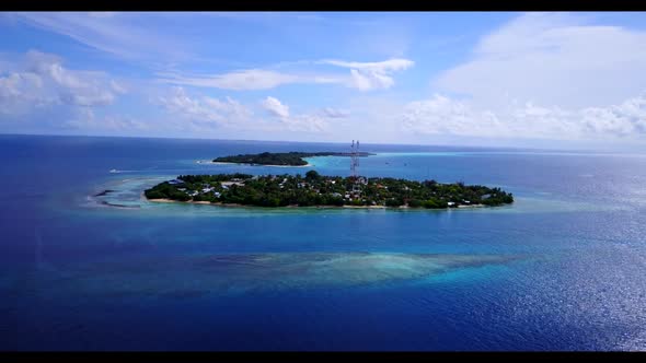 Aerial drone shot panorama of beautiful sea view beach break by blue ocean and white sandy backgroun