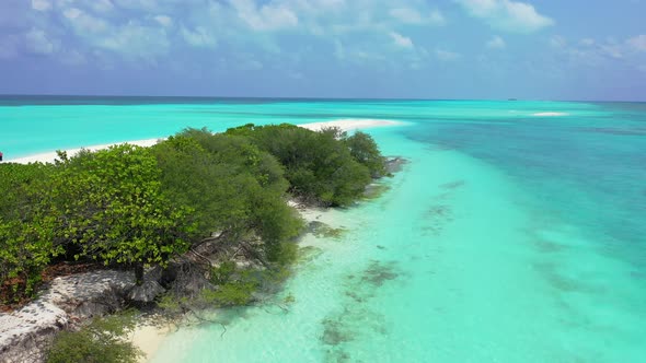 Luxury drone copy space shot of a sandy white paradise beach and aqua turquoise water background in 