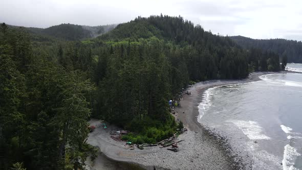 Drone approaching vast temperate rainforest that covers the wild and untouched west coast of Vancouv