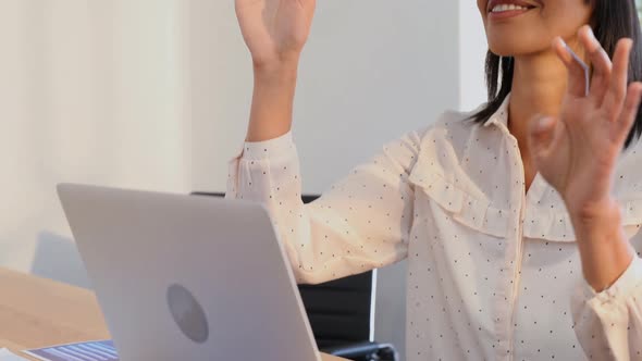 Female executive using virtual reality headset 4k