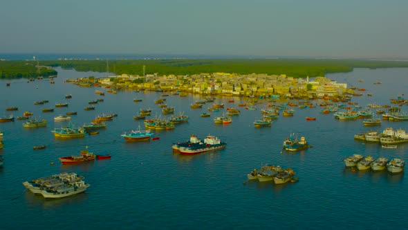 A busy port with ships of fishermen.