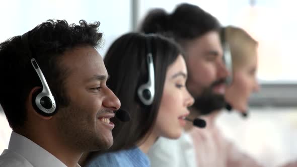 Cheerful Indian Dispatcher, Close Up Side View.