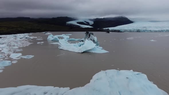 Flying over a glacier lake in Iceland