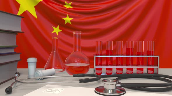 Clinic Laboratory Equipment on Chinese Flag Background
