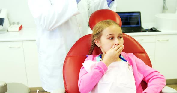 Young patient scared during a dental check-up