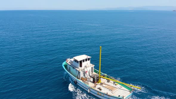 A Small Fishing Boat Goes To the Open Sea To Search for and Catch Salmon.