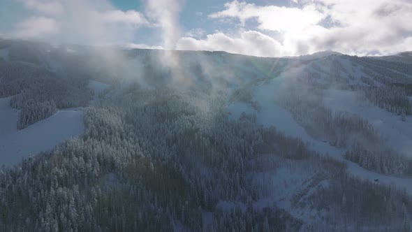 Panorama of Alpine Landscape with Mountains Covered with White Frosty Snow