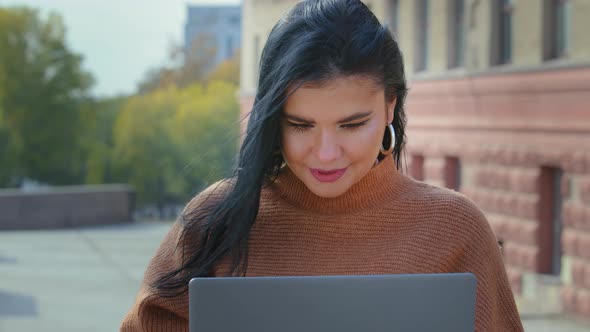 Closeup Young Businesswoman Freelancer Sitting Outdoors Working on Laptop Happy Hispanic Girl