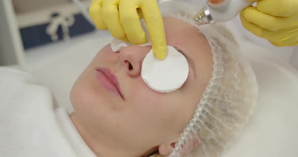 Cosmetology Facial Skin Care Treatment Cleaning. Beautician Hands At Work, Cleaning Skin With 