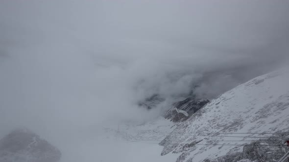 Timelapse of clouds covering the mountains