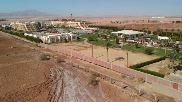 Flying from above over the hotel and the desert near Hurghada.