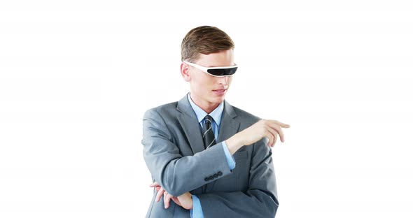 Businessman in virtual video glasses using digital screen