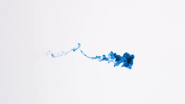 Isolated Blue Ink Cloud in Macro Slow Motion on White Background