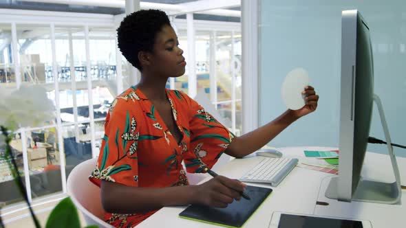 Young woman working in a creative office