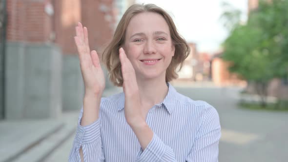 Portrait of Happy Woman Clapping Applauding