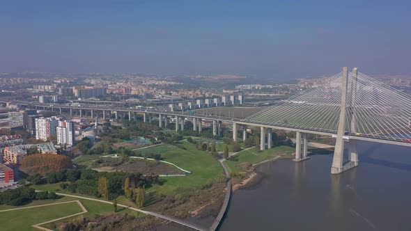 Lisbon Portugal Aerial View of the Vasco Da Gama Bridge City and Park Views on a Foggy Beautiful