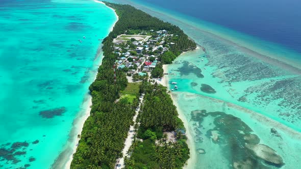 Beautiful overhead abstract shot of a paradise sunny white sand beach and blue ocean background in v