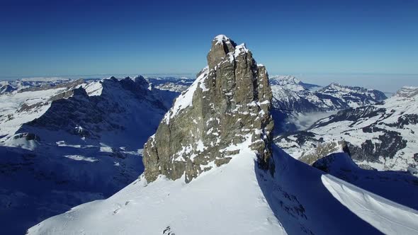 Flying Above Snow Mountain Landscape