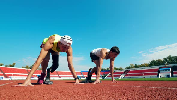 Start of a Race Between Two Paralympic Runners