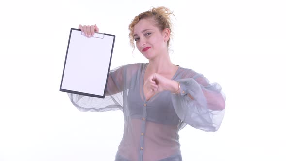 Stressed Blonde Woman Showing Clipboard and Giving Thumbs Down