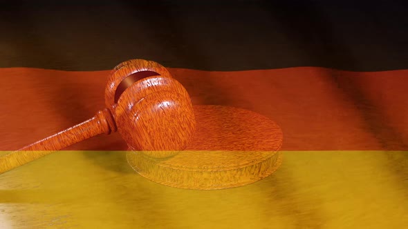 German judiciary. Flag of Germany and Judge's gavel.