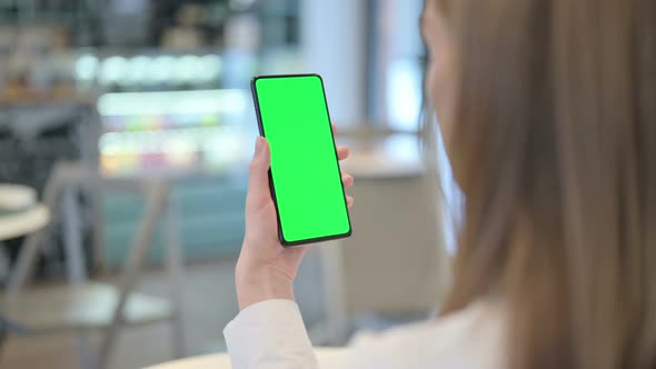 Woman Watching Video on Smartphone with Chroma Screen