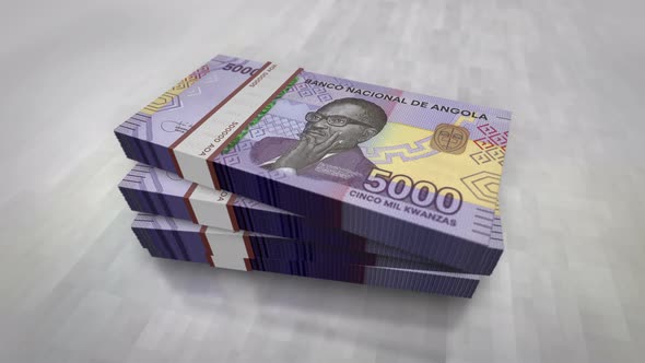 Angola Kwanza money banknote pile packs