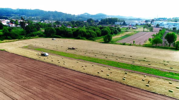 Tractor Machinery Working Ground Soil in Countryside