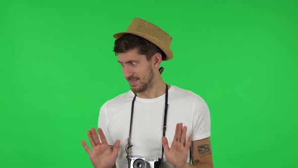 Portrait of Confident Guy Is Pointing Himself, Say Who Me No Thanks i Do Not Need. Green Screen