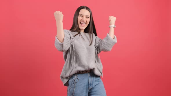 Yes, I Done It. Excited Girl with Joyful Expression, Celebrates Her Success