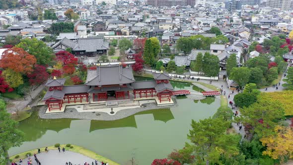 Byodoin temple (Byodo-in) with autumn leaves, Uji City, Kyoto, Japan.