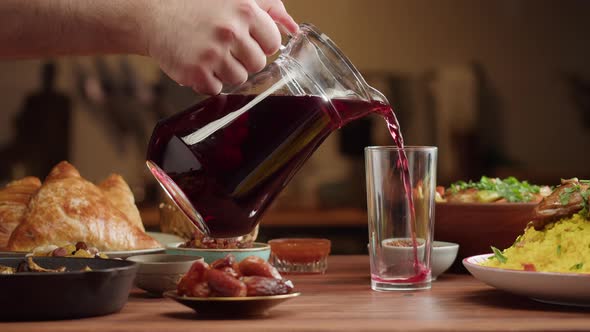 Pouring Juice Muslim Family Dinner Ramadan Iftar