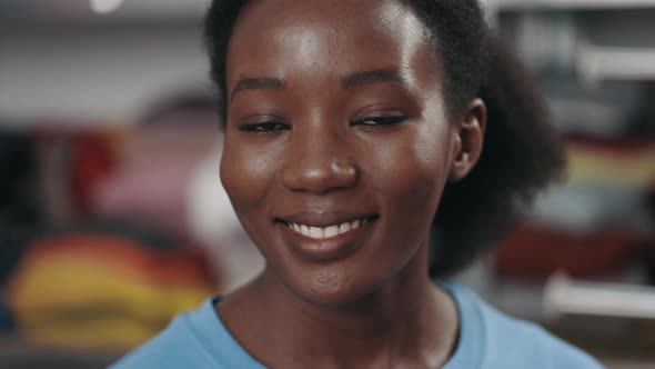 Portrait View of the Multiracial Woman in Volunteer t Shirt Looking at the Camera with Smile