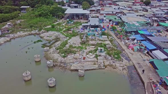 A dynamic orbiting aerial footage of the fishing village in Lau Fau Shan in in the New Territories o