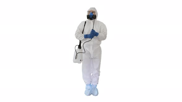 Man in a Protective Suit and Mask Holding a Disinfectant Ready To Work on White Background