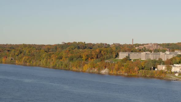 Aerial of autumn forest along Hudson river