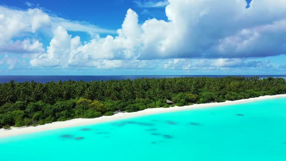 Aerial drone shot landscape of tropical lagoon beach holiday by turquoise sea and white sandy backgr