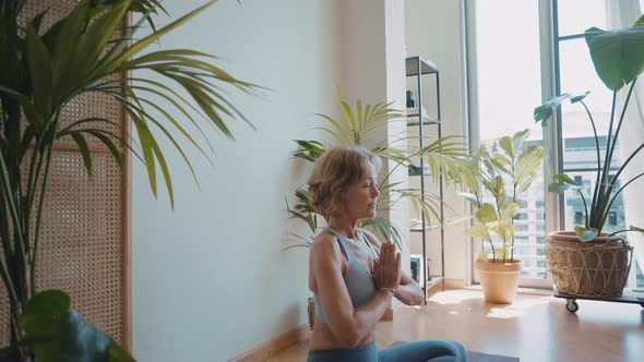 Woman doing yoga at home