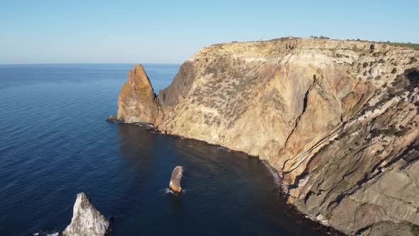 Drone aerial coastal cliffs and rocks