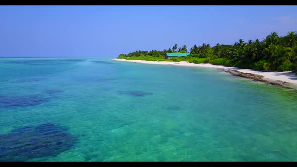 Aerial top view panorama of perfect seashore beach holiday by shallow sea with clean sandy backgroun