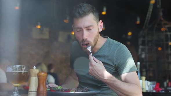 Man Eating Food At Restaurant, Male Enjoying Meat Steak