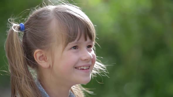 Close Up Portrait of a Pretty Smiling Little Girl