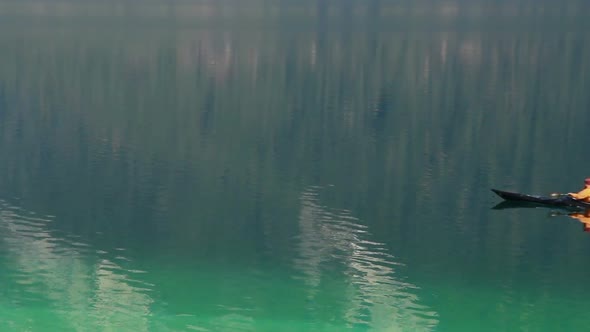 Male Sportsman Enjoying Active Leisure, Rowing on Mirror-Like Lake Water Surface