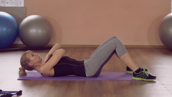 Girl Doing Physical Exercises Abs