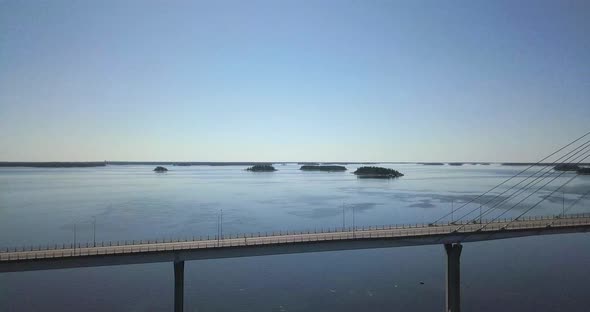 A man jogging midway of the bridge